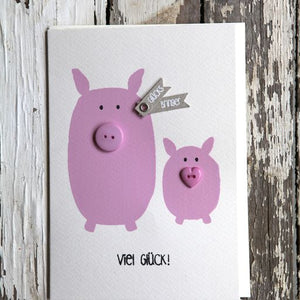 Knopfkarte. Schweine.